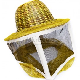 Mask of a beekeeper with a metal mesh, a hat of bamboo