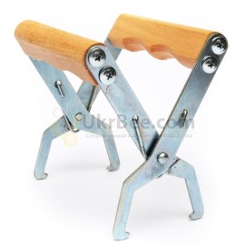The grip for frames with wooden handles