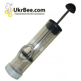 A tube with a hole for marking the queens, 